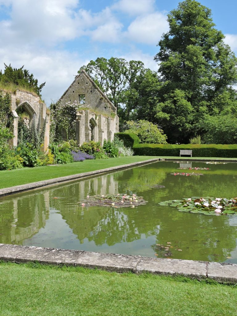 water garden with stone building ruins