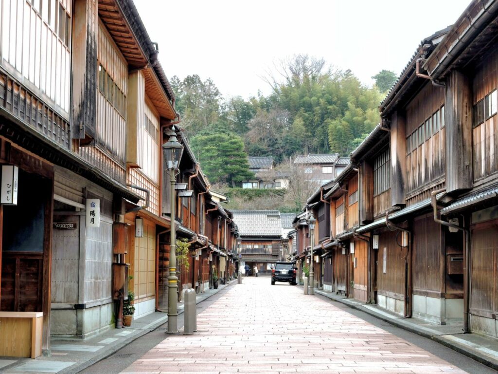 brick street through wooden tea house district
