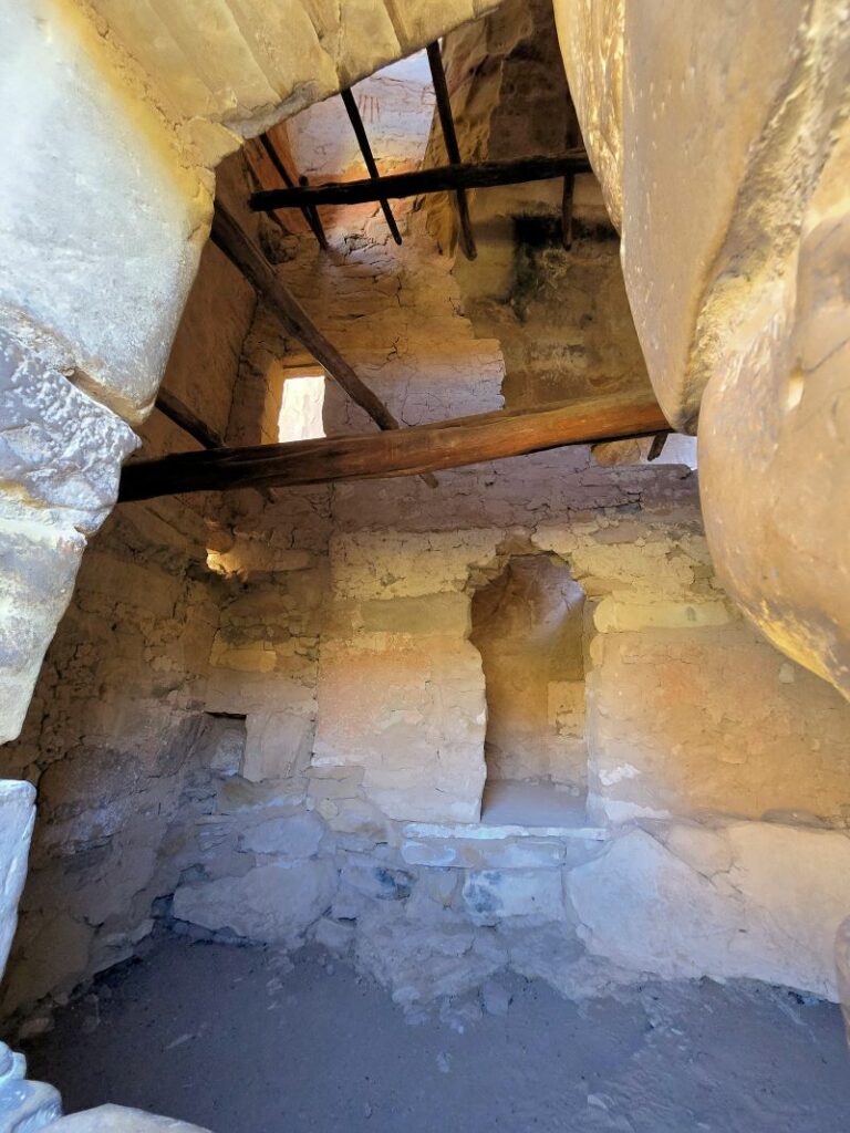 wood beams inside cliff dwelling